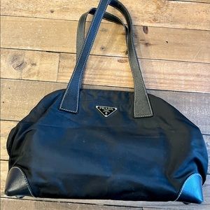 Prada Nylon 2 Handle Tote with leather handles and corners of base.